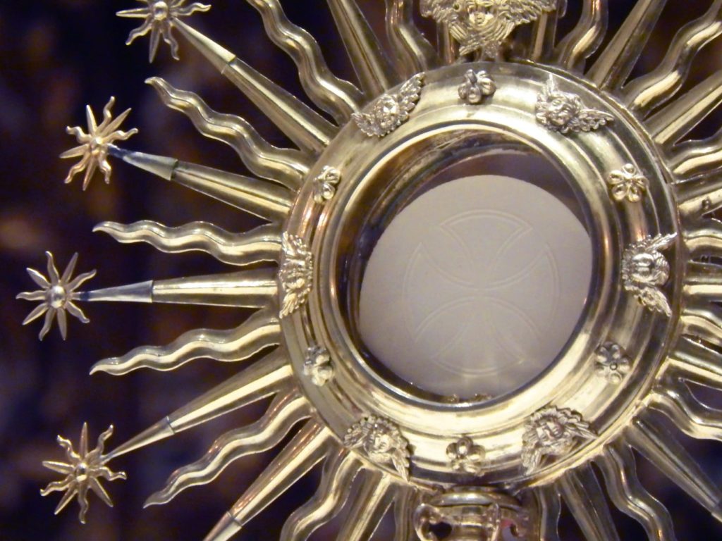 shiny monstrance in catholic church